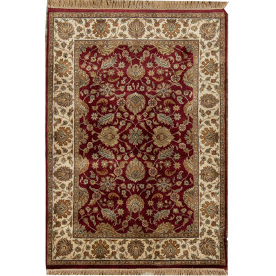 Tapis rouge et ivoire noué à la main de haute qualité