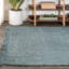 Tapis bleu clair / gris en jute tissé à la main avec franges Sinclair Pata-427209679