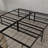 Sleek Black Steel California King Platform Bed Foundation, No Box Spring Required for Bedroom Mattress Setups