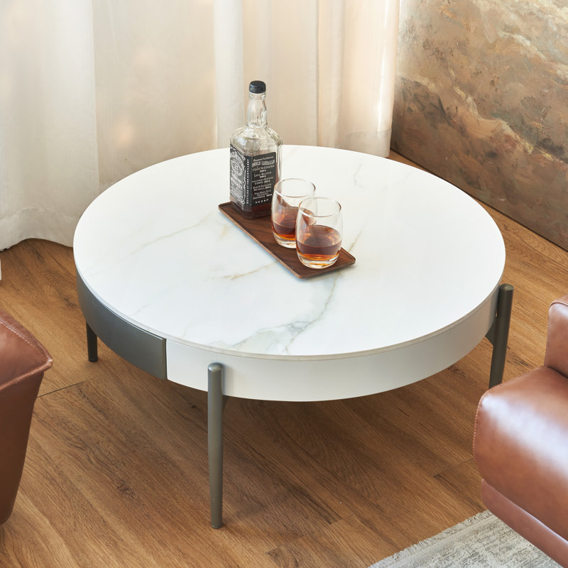 Table basse ronde avec tiroirs et pieds en métal Kux