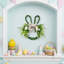 Couronne de lapin de Pâques - Couronne en forme de tête de lapin de 14,5 po avec verdure artificielle et nœud. Décoration de porte mignonne printanière. Décorations de Pâques parfaites pour un mur de ferme, une fenêtre et une maison de vacances