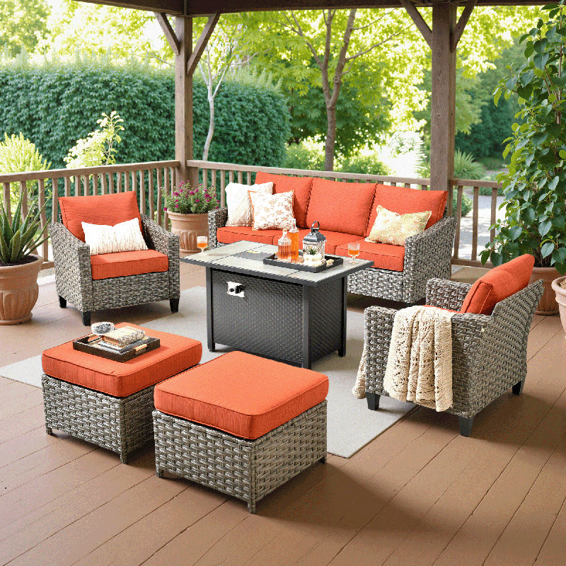 Harbin Wicker Rattan 7 - Person Outdoor Seating Group With Fire Pit Table, Armchairs And Ottomans, Orange