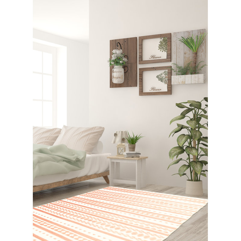 Tapis ivoire / rose en laine à motif géométrique Ellington