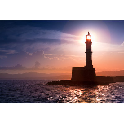 Lighthouse On Sunset by Proslgn - Wrapped Canvas Print