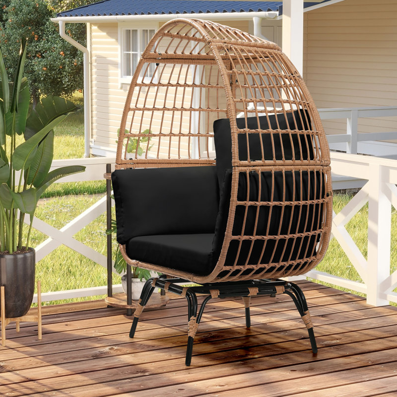 Très grand fauteuil pivotant à 360 °, rotin PEHD toutes saisons avec 4 coussins, capacité de 463 lb pour une utilisation intérieure / extérieure