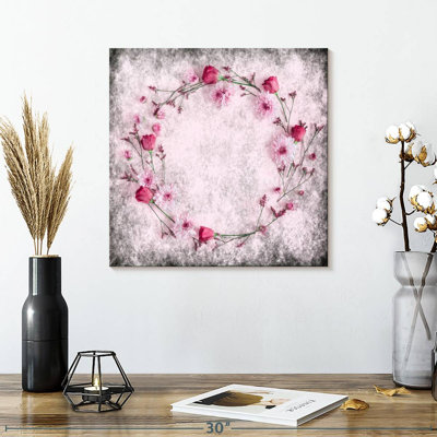 Couronne de fleurs roses sur toile