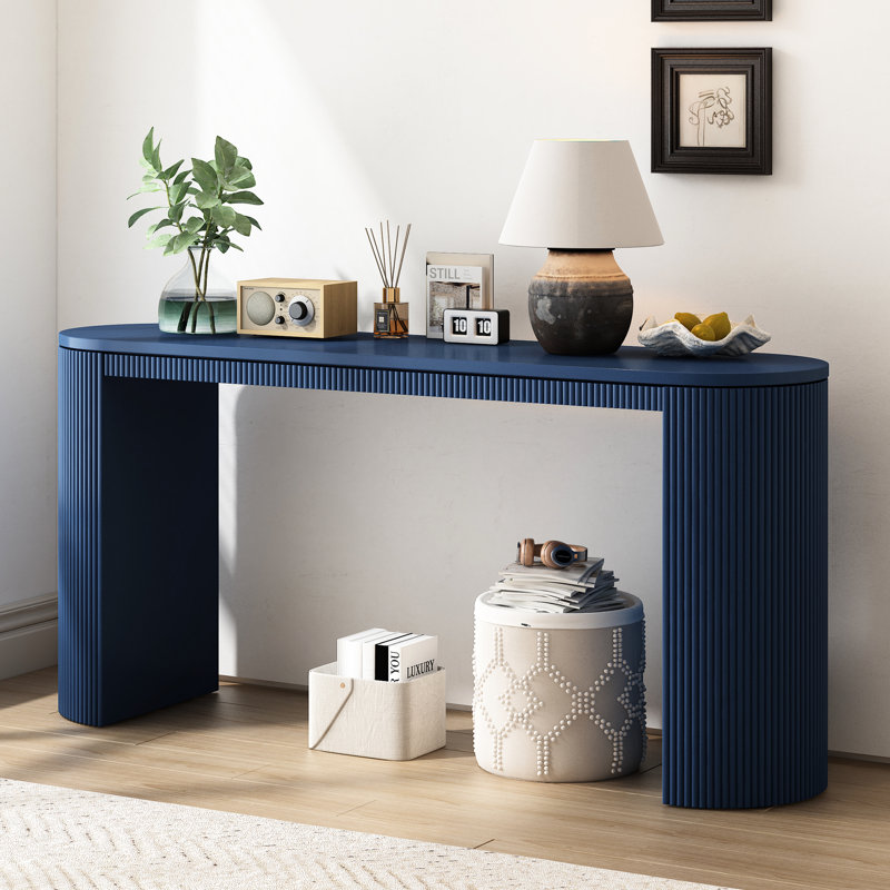 Console avec bureau courbé et finition marine pour le salon - détail à rayures verticales latérales dans le bureau