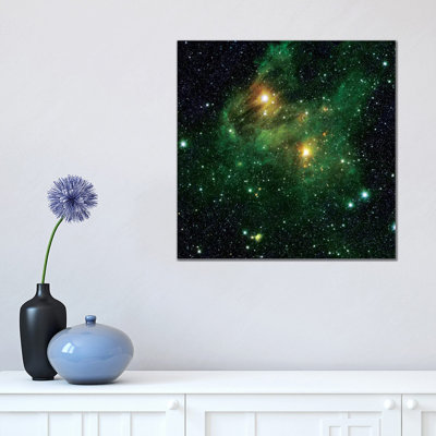 Two Extremely Bright Stars Illuminate A Greenish Mist In Deep Space by Stocktrek Images - Wrapped Canvas Print