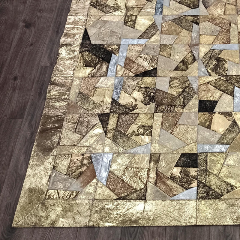 Tapis géométrique en cuir de vache à motif géométrique