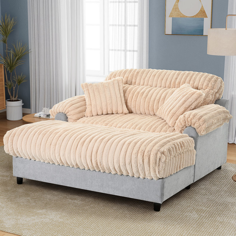 Méridienne moderne avec revêtement moelleux, support ergonomique et assise profonde spacieuse pour une détente ultime.