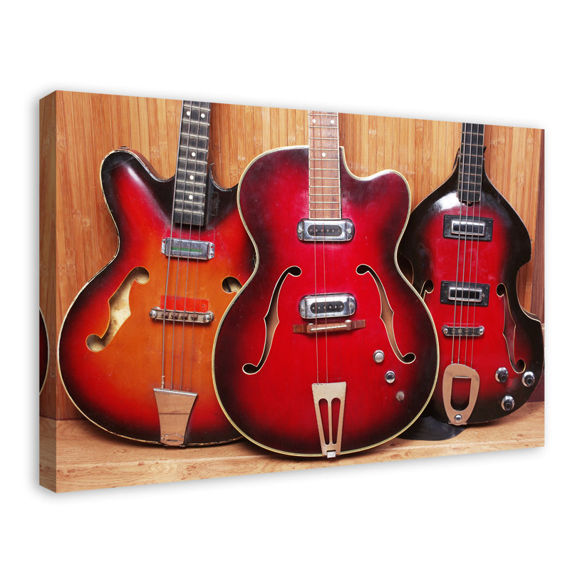 Trois guitares rouges, art sur toile tendue Theda, H 12 po x l 18 po x P 1,25 po