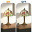 Lampe de table vintage en vitrail avec libellule et motif floral, base bronze antique, lumière décorative