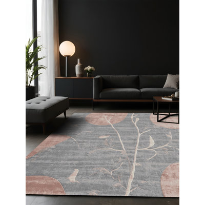Tapis gris soyeux et moelleux