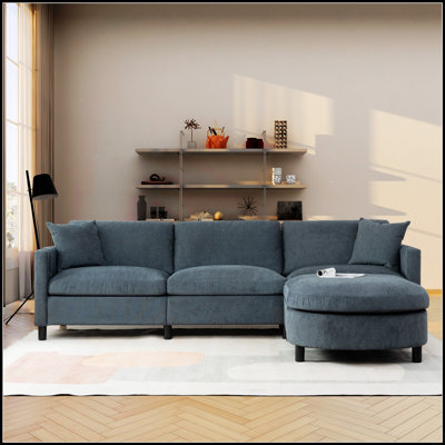 Canapé modulaire spacieux avec repose-pieds mobile et coussins amovibles pour un confort de salon polyvalent