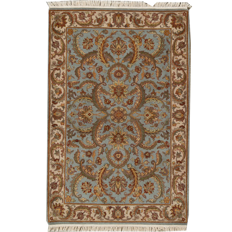 Tapis bleu et ivoire de haute qualité noué à la main