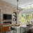 Retha 23.5" Modern 8 - Light Dimmable Tiered Chandelier with Mirrored  Glass Shades  