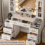 Grand meuble-lavabo de maquillage de 49 po avec prise de courant, miroir, lumières réglables, 7 tiroirs et 2 armoires Mayara-600184601