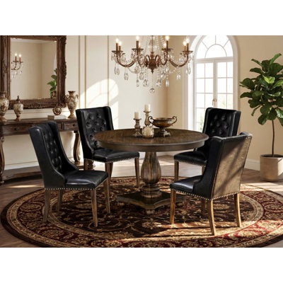 Ensemble de salle à manger 5 pièces comprenant une table de salle à manger ronde avec piédestal et 4 chaises rembourrées en similicuir noir
