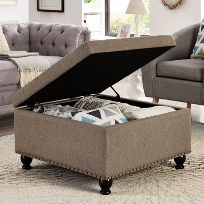 Rangement carré en tissu de lin pour l'organisation de la maison et le style de vie avec des pieds en bois à boutons