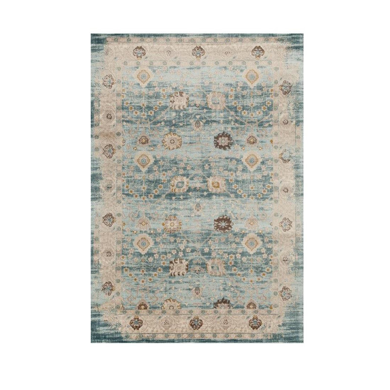 Tapis bleu clair à motif floral Soti