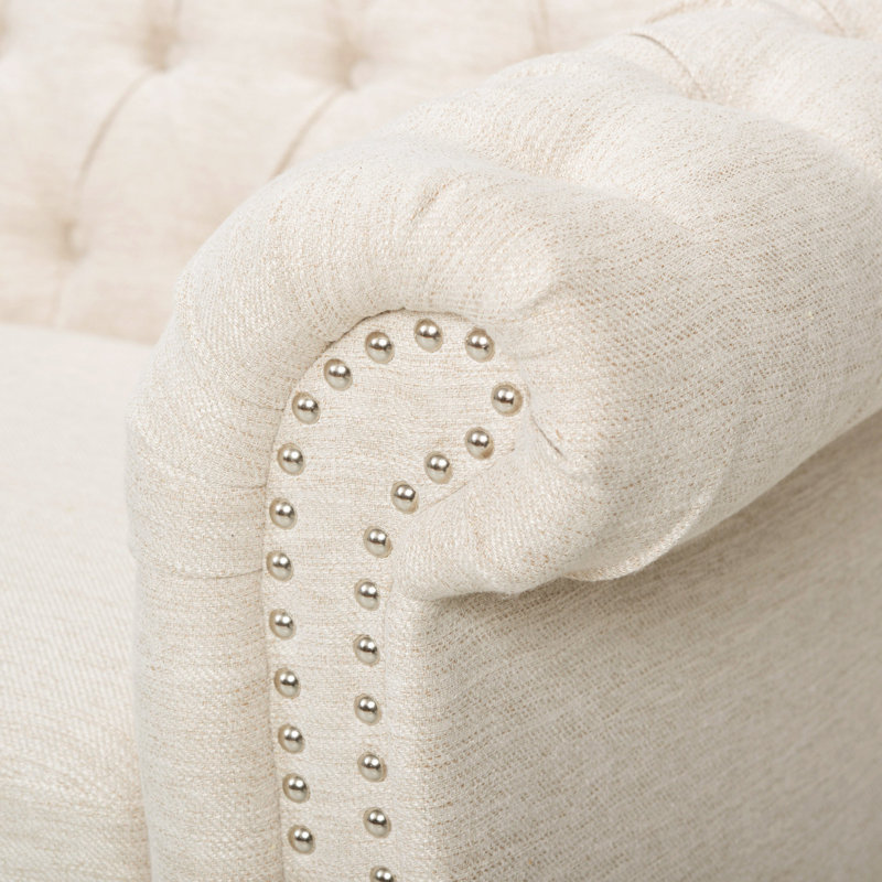 3 places avec revêtement beige et accoudoirs en tissu à volutes classiques