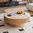 Timeshia Round Coffee Table With Storage-106340852-111202278