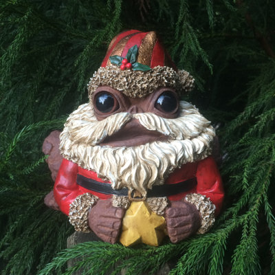 Figurine de père Noël crapaud