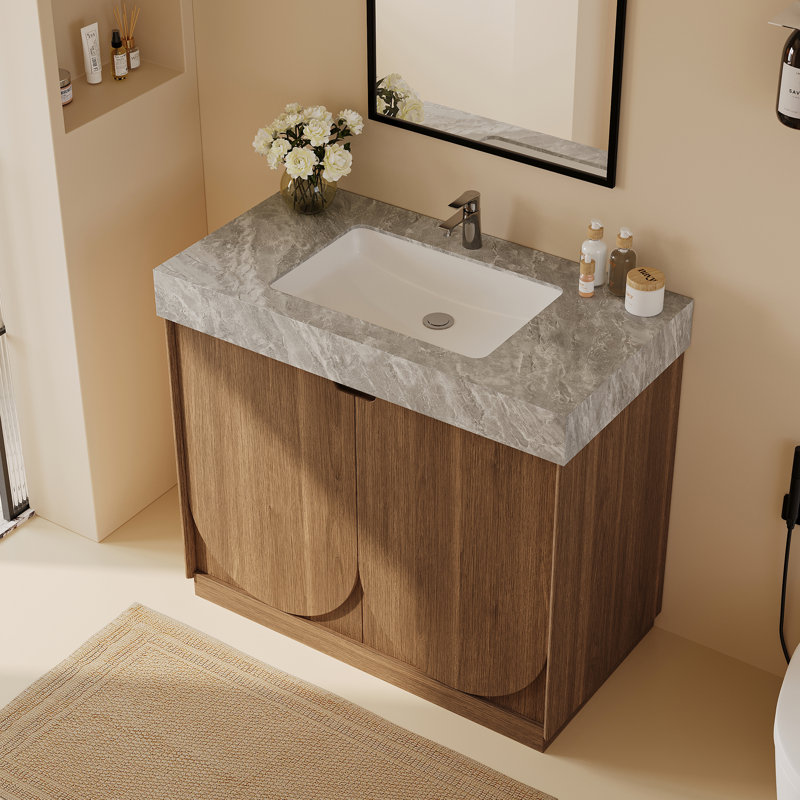 Meuble-lavabo simple 36 po avec lavabo encastré en céramique, comptoir en pierre frittée en marbre gris, armoire en bois brun avec portes incurvées sculptées, charnières à fermeture en douceur