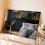 Toile, une chambre à coucher moderne avec un mur noir frappant orné d'art mural complexe en or métallique et vert foncé-1636600895