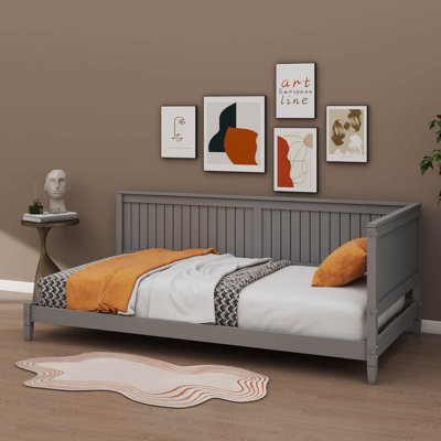 Sleek Minimalist Wooden Daybed Doubling As A Sofa Bed