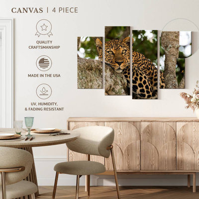 Leopard On Tree Trunk