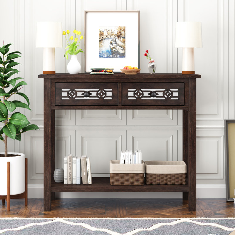 Lonni classique avec décoration évidée, deux tiroirs supérieurs et tablette ouverte, grand espace de rangement pour une pièce limitée