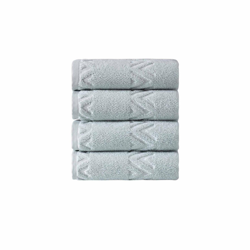 Ensemble de quatre serviettes de toilette géométriques turquoise en coton turc 27" x 54"