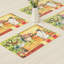 Ensemble de 4 napperons imperméables 12 x 18 pouces bonhomme de neige jaune
