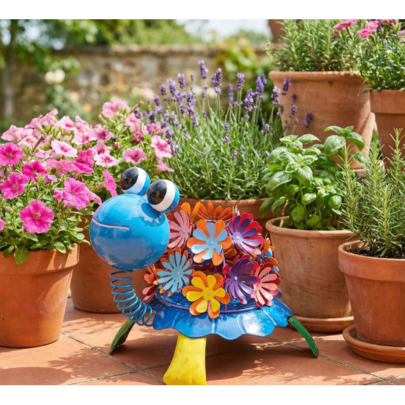 Statue de tortue solaire avec corps floral