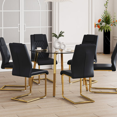 Salle à manger moderne: table en verre trempé et chaises en cuir de polyuréthane à haut dossier transparent avec assise en métal