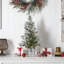 Arbre de Noël pré-éclairé avec pommes de pin et pot décoratif