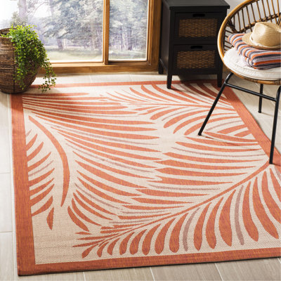 Tapis floral beige / terracotta