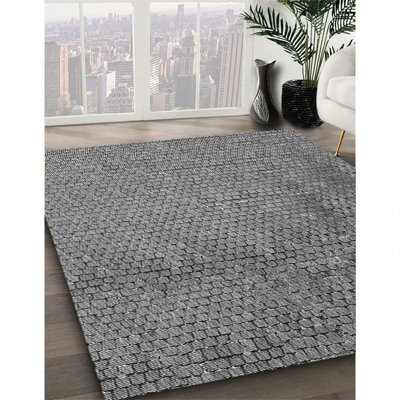 Tapis gris tissé à la machine