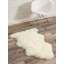 Tapis en peau de mouton de couleur unie Novelty Izola