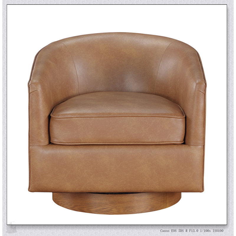 Fauteuil pivotant demi-tonneau en similicuir Maisy