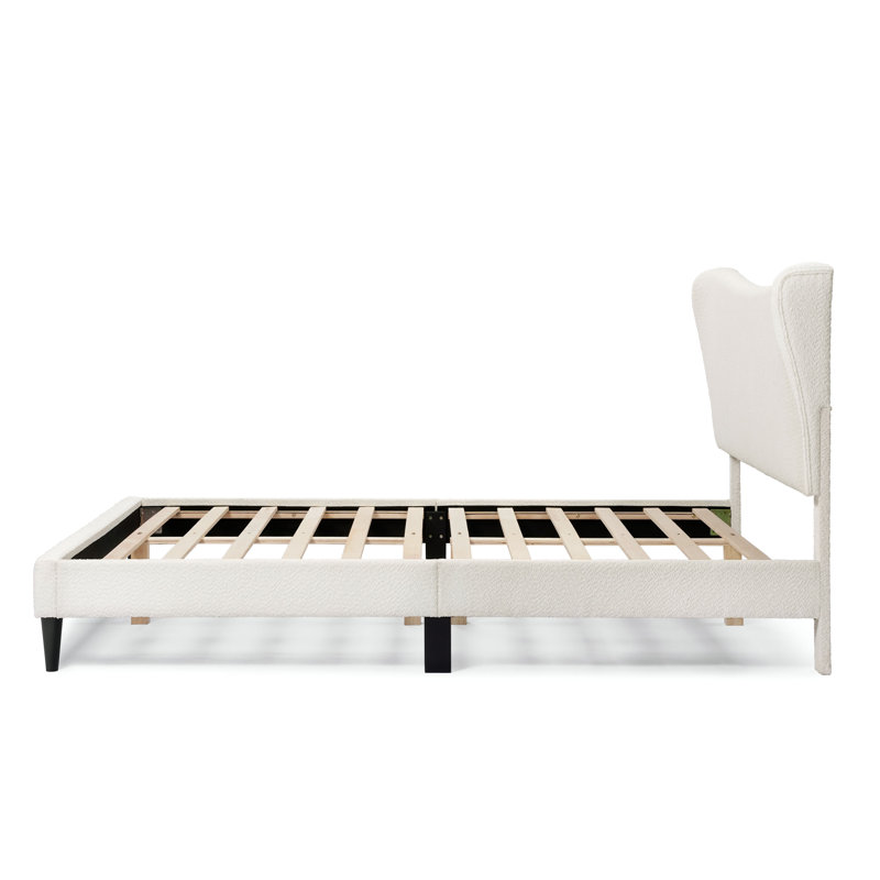 Anij Upholstered Wingback Bed