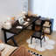 Bureau tout en bois noir en forme de L avec armoires ouvertes-186531046