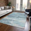 Tapis bleu sarcelle lavable à la machine intérieur / extérieur Xhevrie-774722394