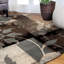 Tapis rond beige et gris à motif floral tissé à la machine 8 pi