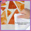 Édredon orange à formes triangulaires-123991728