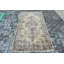 Tapis turc rétro avec un élégant motif floral beige et brun pour un décor oriental unique
