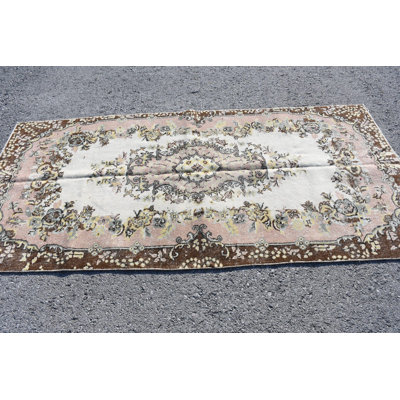 Tapis turc antique rose pour les espaces de chambre à coucher fabriqué à la main avec un motif tribal