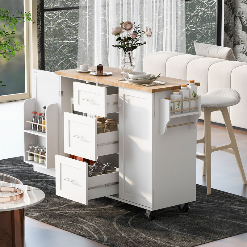 Îlot de cuisine roulant avec rangement, plateau en bois d'hévéa, 3 tiroirs, 2 tablettes coulissantes et supports internes pour une organisation et une mobilité accrues