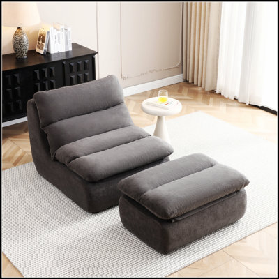 Pouf ergonomique rembourré avec repose-pieds pour une détente optimale et un soutien corporel parfait dans les espaces de vie.